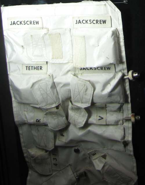 photo of container labeled with many compartments for NASA