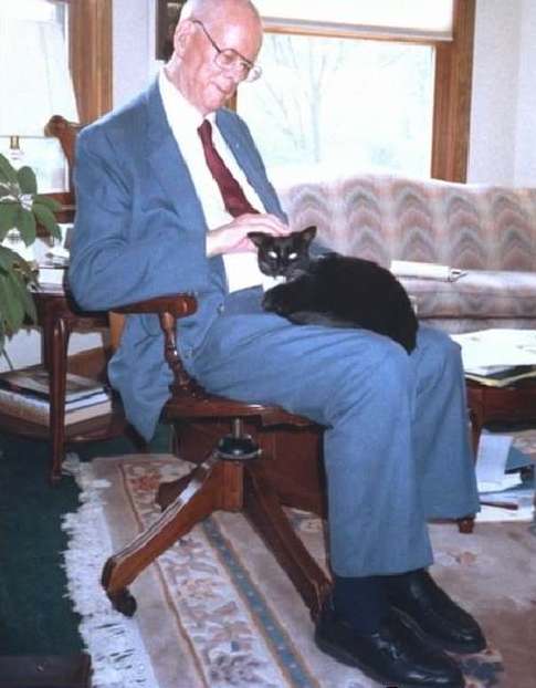 photo of W. Edwards Deming with a cat